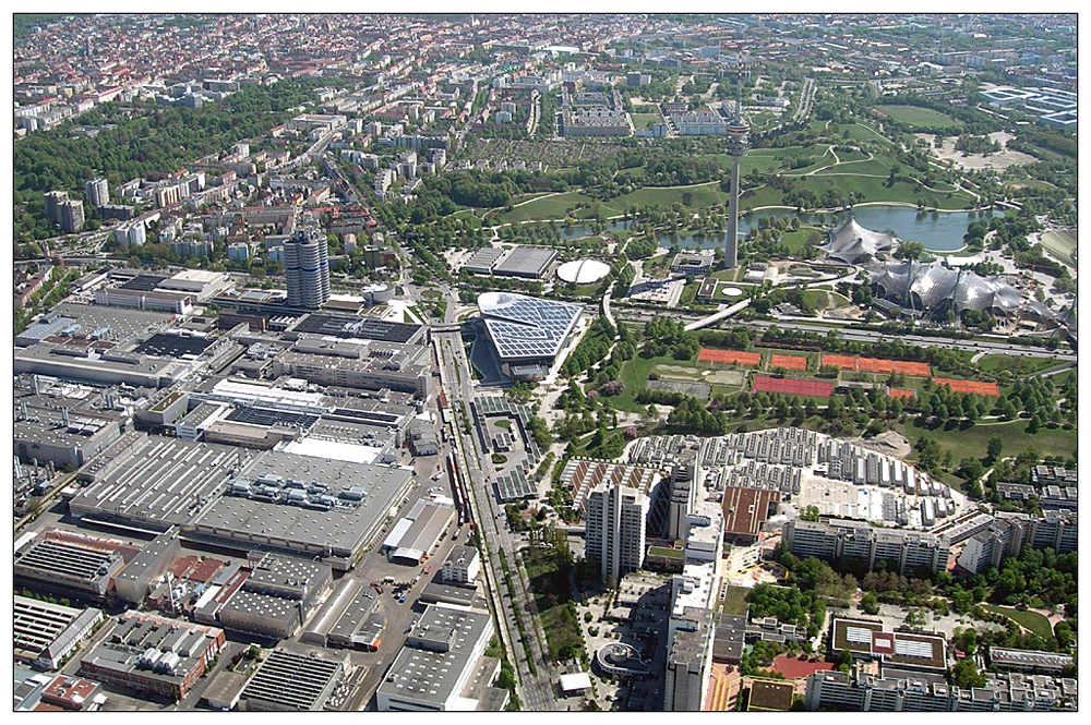 Aerial view showing BMW factory buildings and the BMW Four-Cylinder building in Munich.