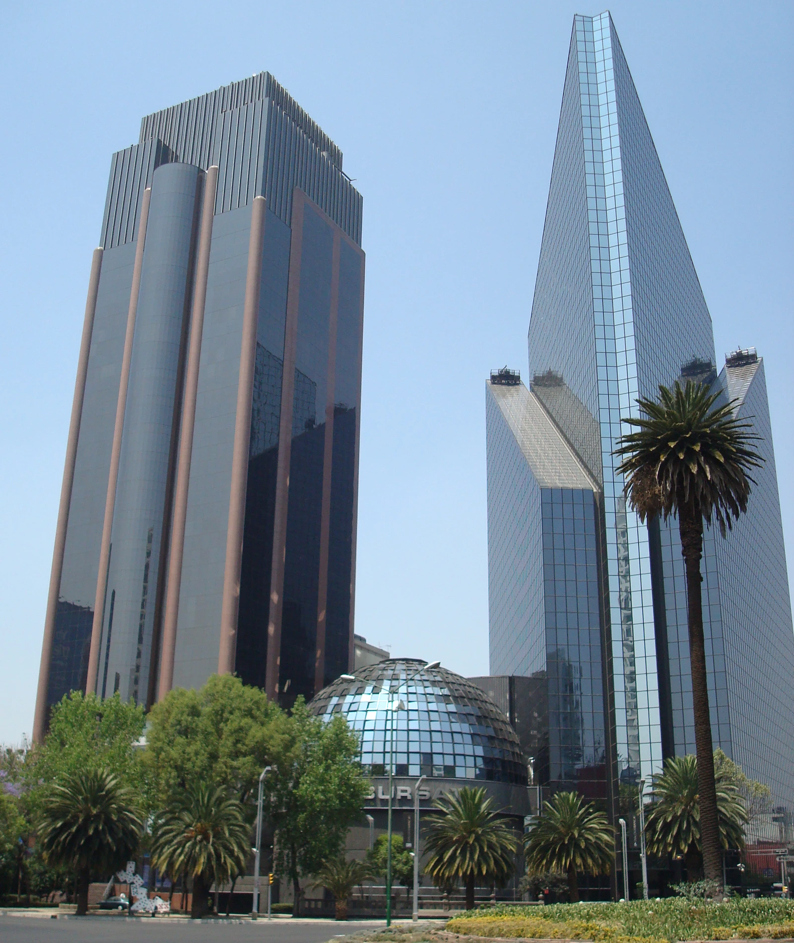 The Bolsa Mexicana de Valores building, a glass dome, with tall buildings in the background.