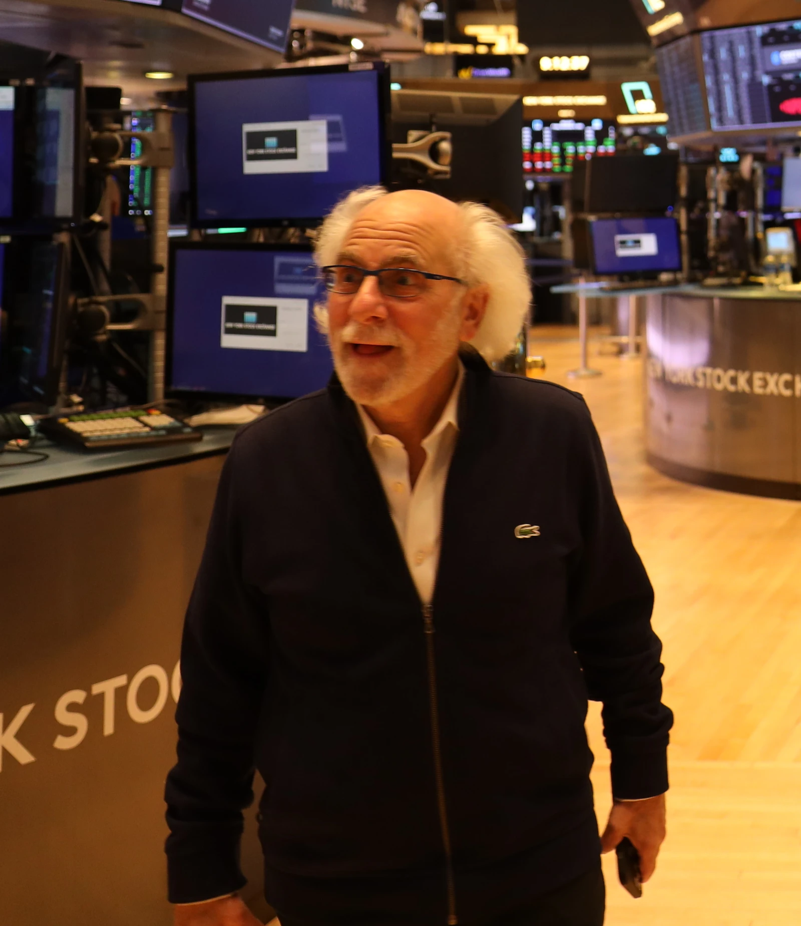 Peter Tuchman, NYSE stock trader, walking on the trading floor.