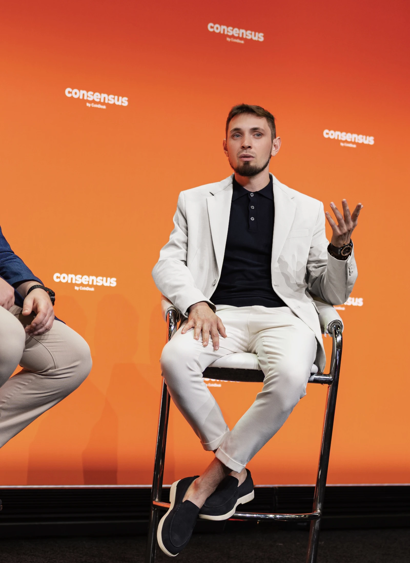Yaroslav Ivanov, Co-Founder and CVO of ALTA Blockchain Labs, speaking at a conference.