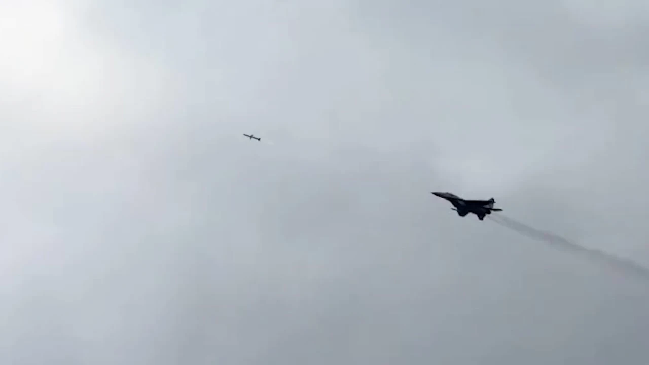 Ukrainian Air Force MiG-29 fighter jet firing an AIM-7 Sparrow missile.