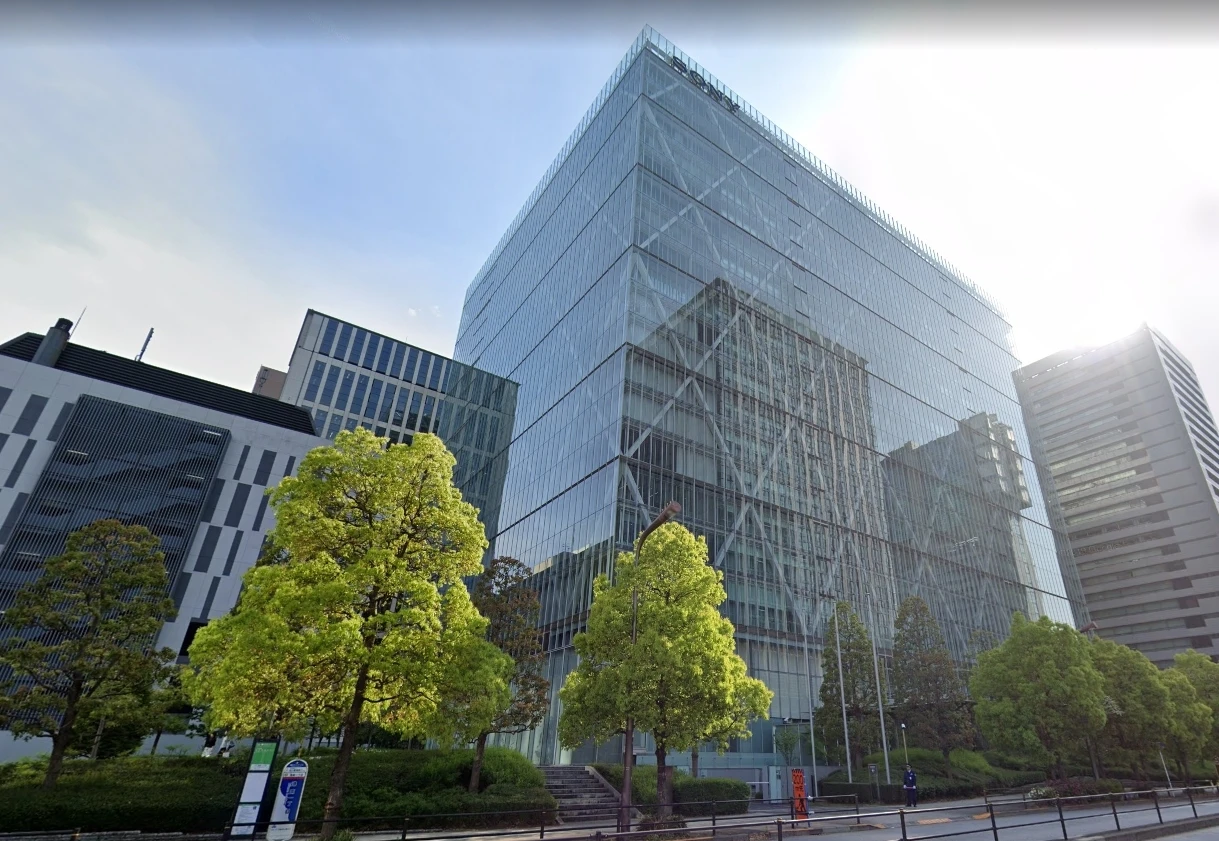 Sony Corporation headquarters building, a modern glass skyscraper in Tokyo, Japan.