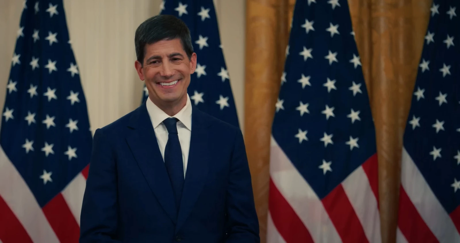 Kevin Warsh, former Federal Reserve governor, smiling at a formal event.