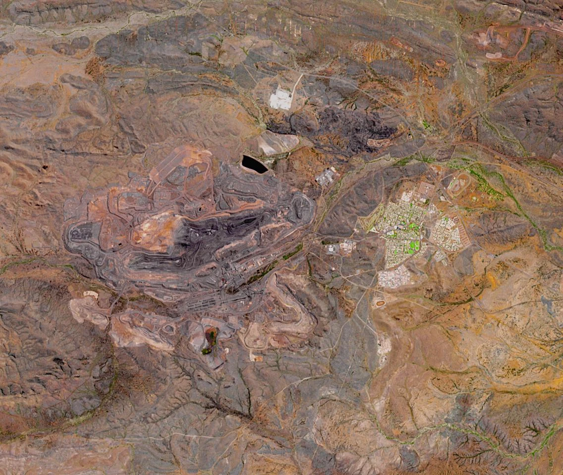 Aerial view of Mount Whaleback iron ore mine, a massive open-pit operation.