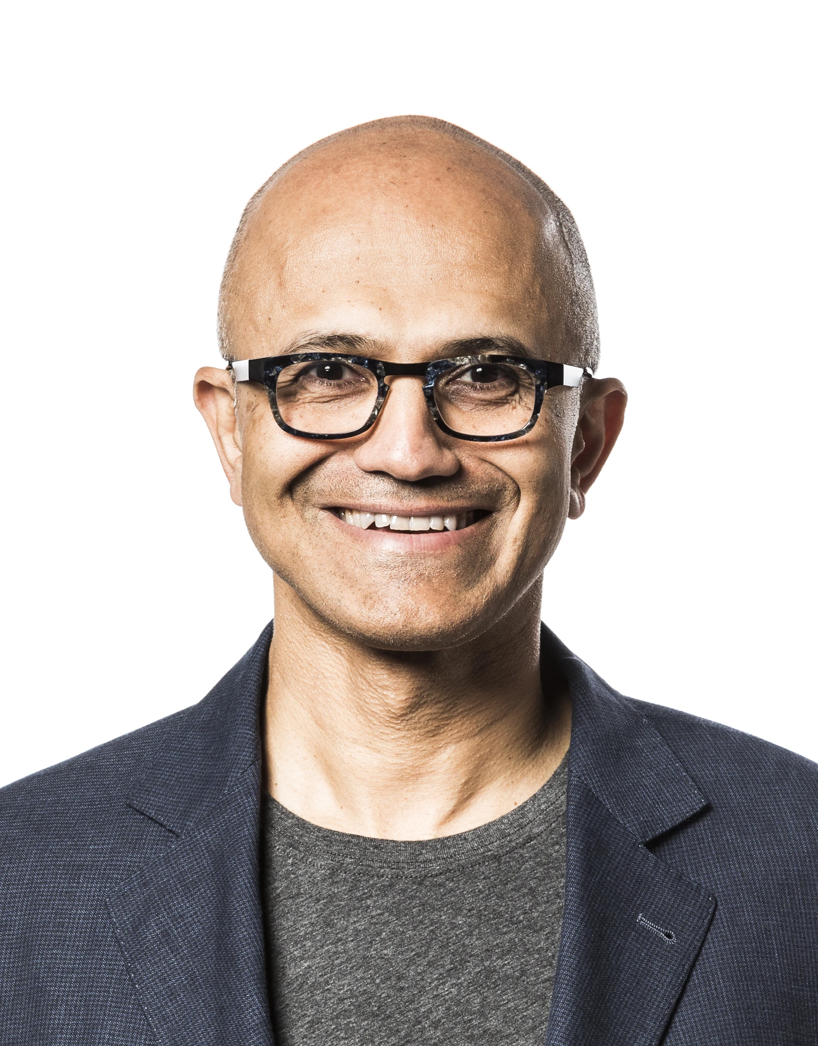 Satya Nadella, CEO of Microsoft, smiling and looking directly at the camera.