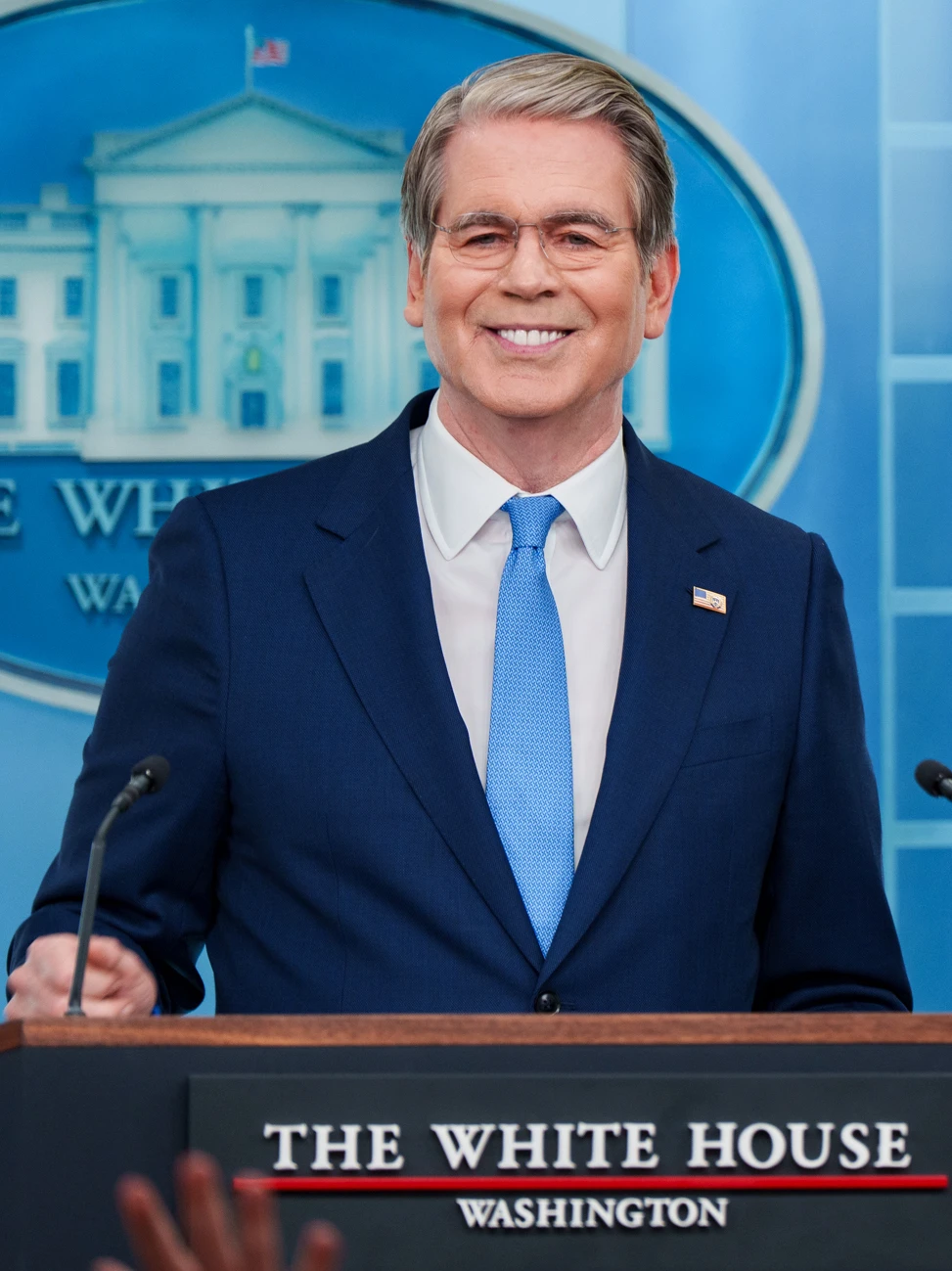 Treasury Secretary Scott Bessent speaking at a press briefing podium at the White House.
