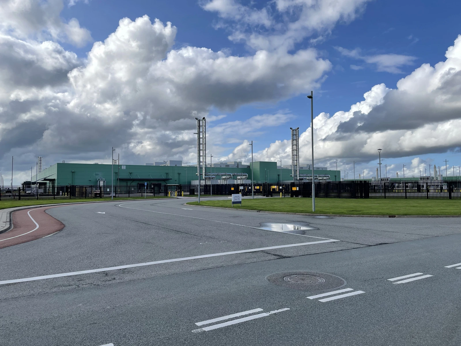 Microsoft Data Center building in Middenmeer, Netherlands, with roads and green landscaping.