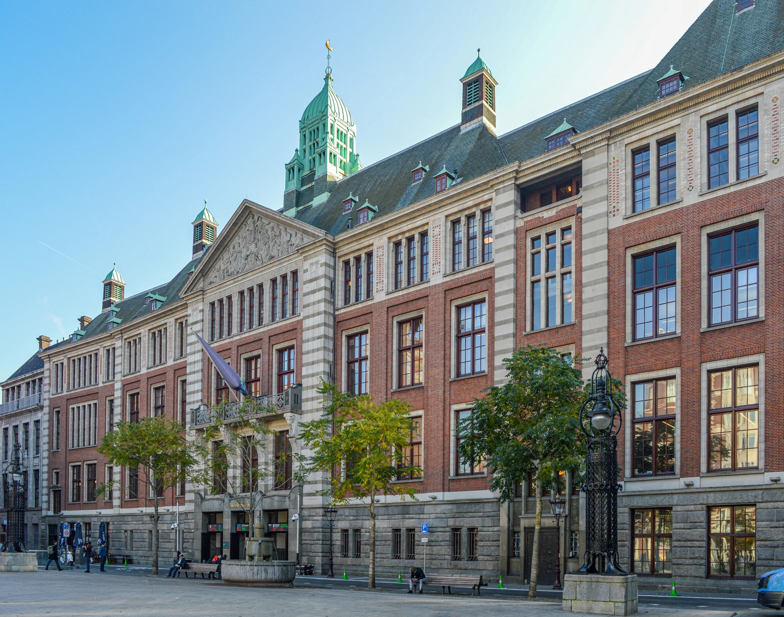 Beursplein 5 building, the Amsterdam Stock Exchange, with people in the foreground.