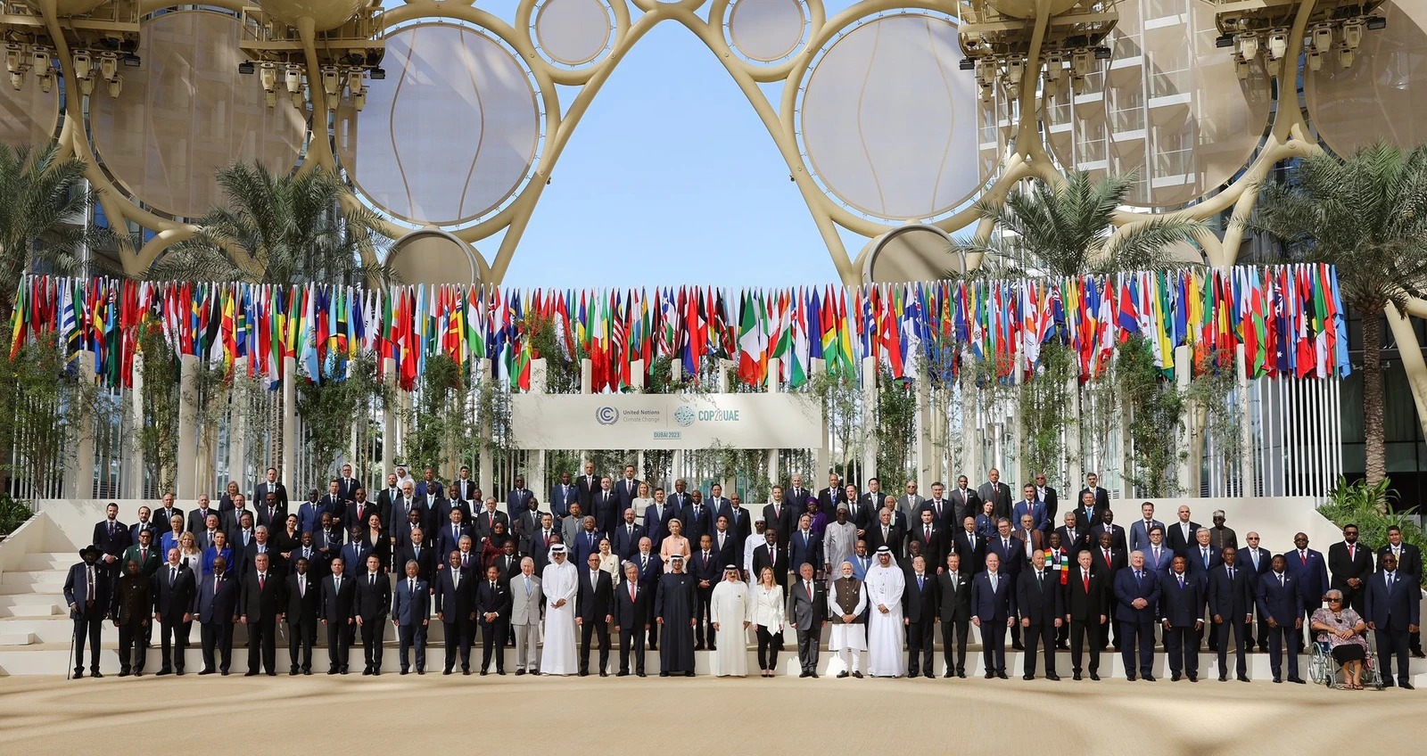 Global leaders pose for a group photo at the COP 28 World Climate Action Summit.